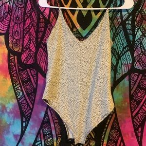 cheetah print bodysuit, size small but fits like medium